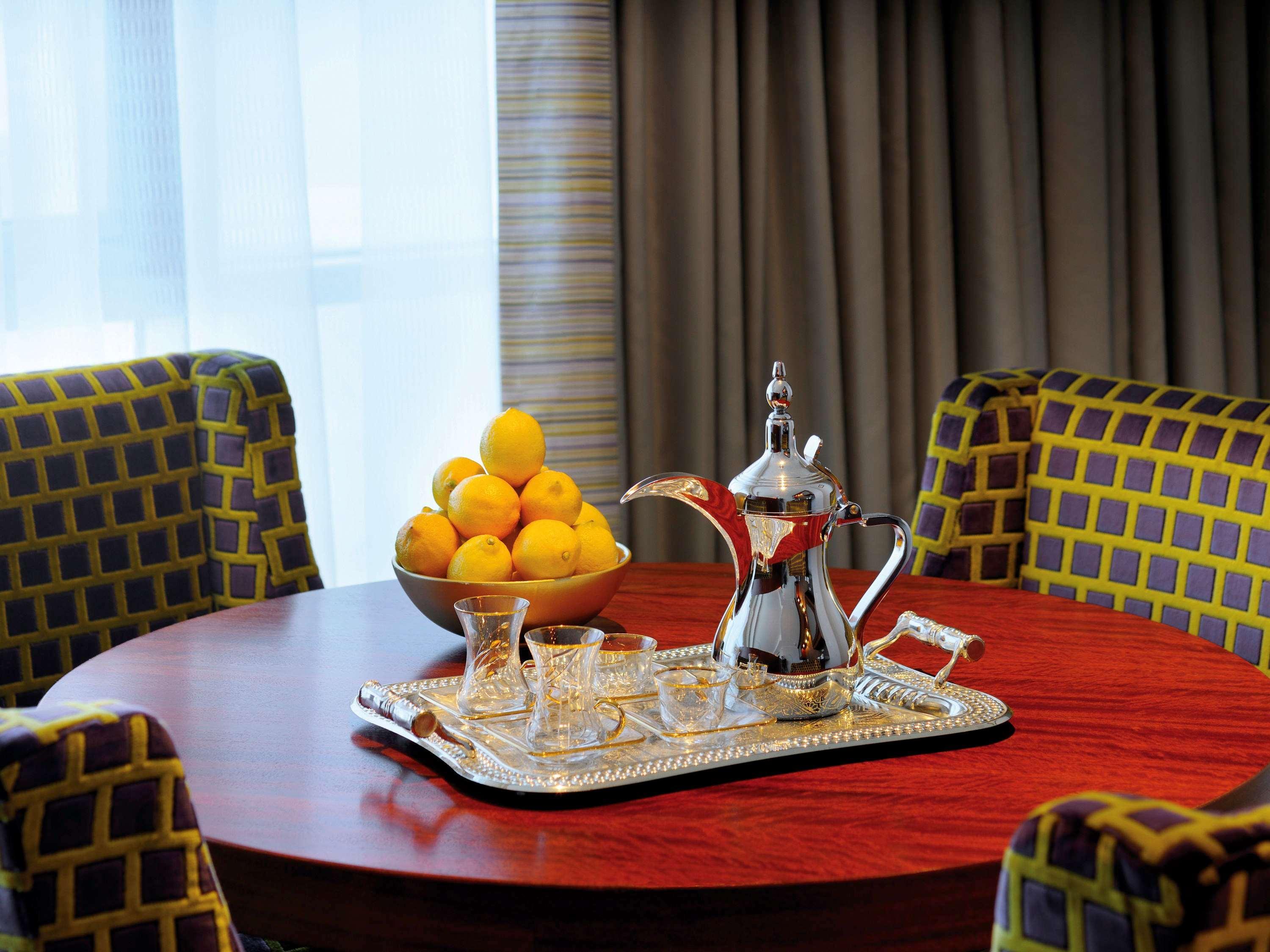 Qabila Westbay Hotel By Marriott Doha Kültér fotó A traditional Arabic coffee pot